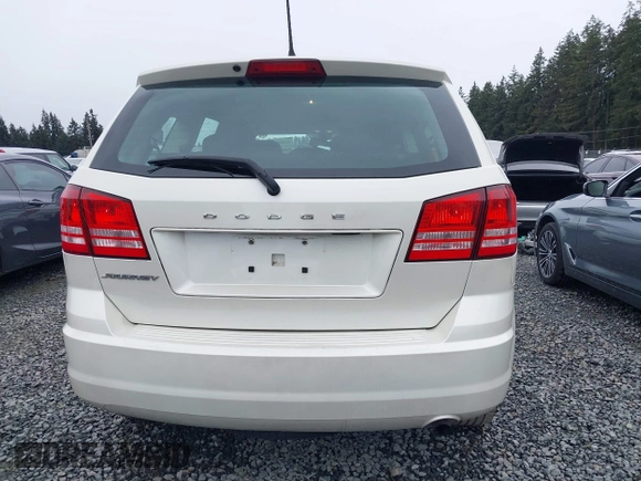 2015 Dodge Journey SE z VIN 3C4PDCAB6FT736330, wystawiony jako IAAI lot #41837047 z przebiegiem 123 567 mil mil oraz . Historia ofert i sprzedaży dostępna na DreamBid. Obrazek 17.