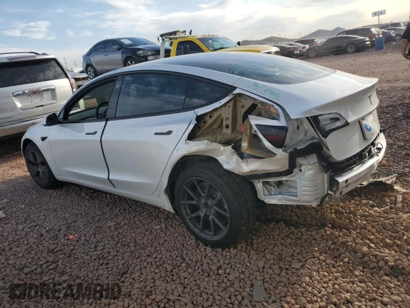2021 Tesla Model 3 Standard Range Plus with VIN 5YJ3E1EA2MF923156, listed as a Copart auction lot 50098135 with 50,917 mi miles and Salvage Title. Bid and sale history available at carsss.com. Image 2.