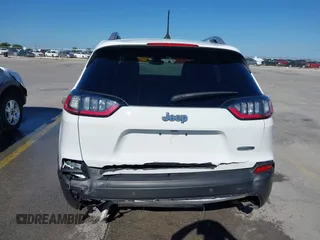 2021 Jeep Cherokee Altitude with VIN 1C4PJLLB5MD173828, listed as a IAAI auction lot 42234912 with 66,400 mi miles and . Bid and sale history available at DreamBid. Image 6.
