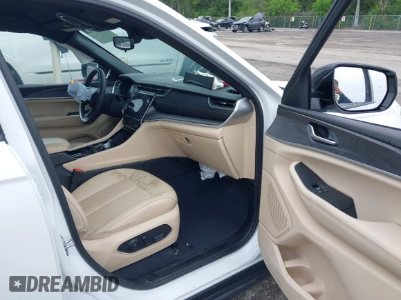 2023 Jeep Grand Cherokee Limited with VIN 1C4RJGBGXPC544537, listed as a IAAI auction lot 42421312 with 61,321 mi miles and . Bid and sale history available at DreamBid. Image 5.