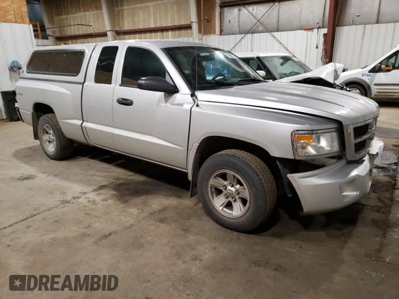 2010 Dodge Dakota with VIN 1D7CW2BK3AS184268, listed as a Copart auction lot 48260235 with 60,542 mi miles and Salvage title. Bid and sale history available at DreamBid. Image 4.