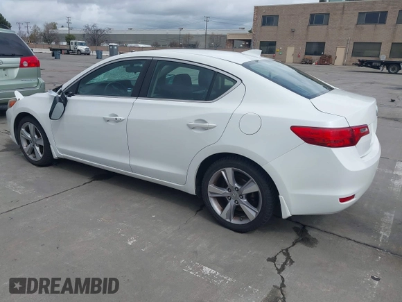 2014 Acura ILX with VIN 19VDE1F34EE000679, listed as a IAAI auction lot 41799014 with 136,514 mi miles. Bid and sale history available at carsss.com. Image 3.