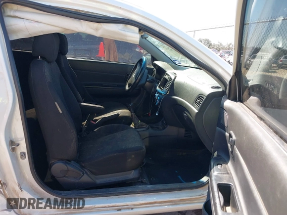 2007 Hyundai Accent GS with VIN KMHCM36C47U050161, listed as a IAAI auction lot 41762927 with 111,684 mi miles. Bid and sale history available at carsss.com. Image 5.