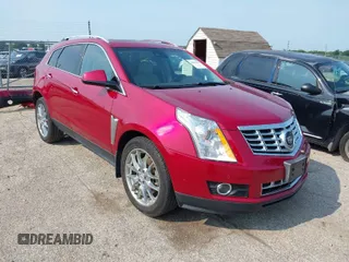 2014 Cadillac SRX Premium Collection z VIN 3GYFNGE33ES523885, wystawiony jako IAAI lot #39866649 z przebiegiem 14 437 mil mil oraz . Historia ofert i sprzedaży dostępna na DreamBid. Obrazek 1.