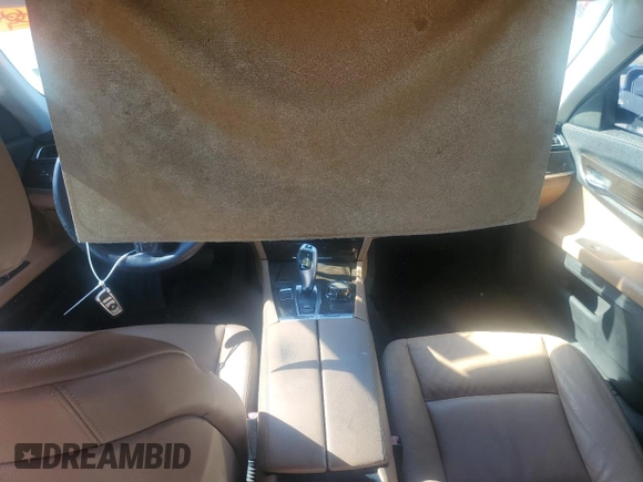 2012 BMW 7 Series 740i with VIN WBAKA4C52CDS99036, listed as a Copart auction lot 88492615 with Not provided miles and Salvage title. Bid and sale history available at DreamBid. Image 8.