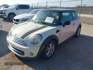 2013 MINI Hardtop with VIN WMWSU3C56DT681952, listed as a IAAI auction lot 42325521 with 124,405 mi miles and . Bid and sale history available at DreamBid. Image 2.