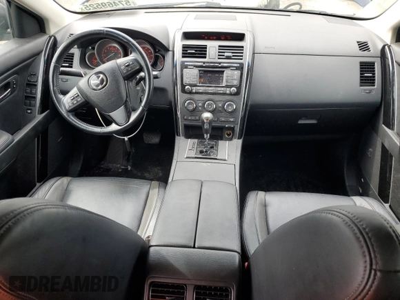 2011 Mazda CX-9 Touring with VIN JM3TB3CA0B0310947, listed as a Copart auction lot 57469525 with 110,443 mi miles and Salvage title. Bid and sale history available at DreamBid. Image 8.