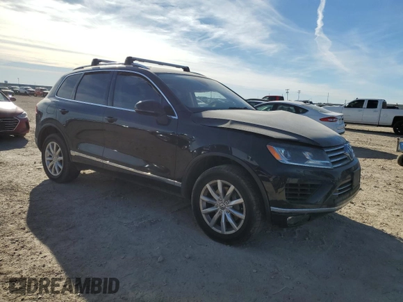 2016 Volkswagen Touareg Sport with VIN WVGEF9BP9GD010964, listed as a Copart auction lot 85800844 with 157,563 mi miles and Salvage Title. Bid and sale history available at DreamBid. Image 4.