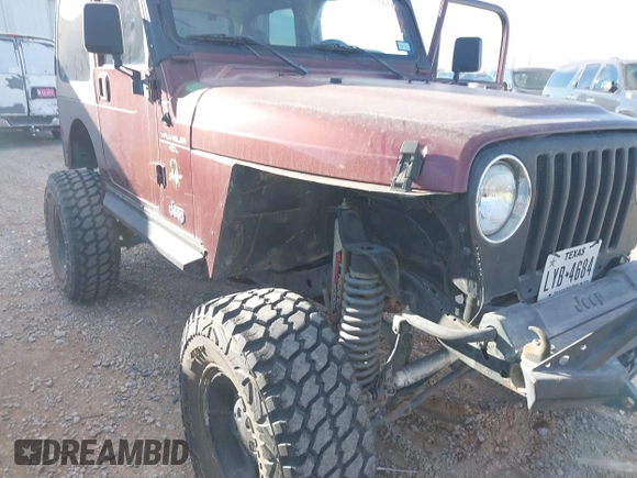2001 Jeep Wrangler Sahara with VIN 1J4FA59S71P326941, listed as a IAAI auction lot 41648420 with 128,464 mi miles. Bid and sale history available at carsss.com. Image 6.