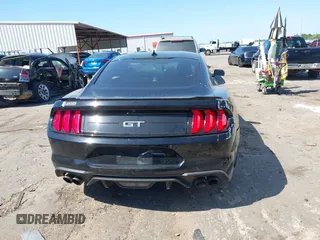 2021 Ford Mustang GT z VIN 1FA6P8CFXM5156002, wystawiony jako IAAI lot #42009222 z przebiegiem 65 939 mil mil oraz . Historia ofert i sprzedaży dostępna na DreamBid. Obrazek 16.