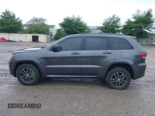 2017 Jeep Grand Cherokee Trailhawk with VIN 1C4RJFLG2HC645209, listed as a IAAI auction lot 42348470 with 170,905 mi miles and . Bid and sale history available at DreamBid. Image 14.