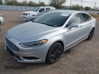 2018 Ford Fusion Energi SE with VIN 3FA6P0PU4JR123581, listed as a IAAI auction lot 41134246 with 226,813 mi miles. Bid and sale history available at carsss.com. Image 2.