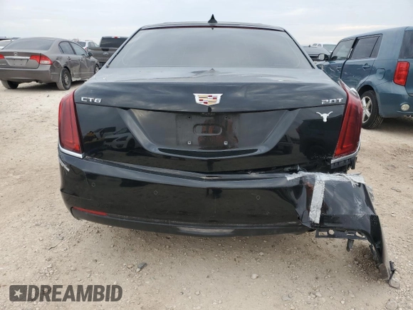 2018 Cadillac CT6 Luxury RWD z VIN 1G6KC5RX8JU103595, wystawiony jako Copart lot #47438045 z przebiegiem 135 004 mil mil oraz Czysty tytuł • Clean title. Historia ofert i sprzedaży dostępna na DreamBid. Obrazek 6.