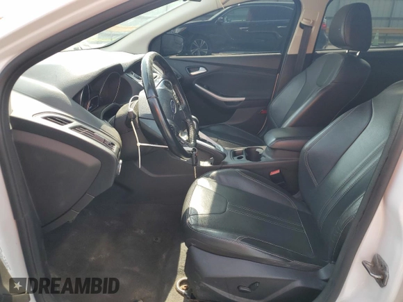 2013 Ford Focus SE with VIN 1FADP3F27DL258565, listed as a Copart auction lot 60662385 with 174,213 mi miles and Salvage title. Bid and sale history available at DreamBid. Image 7.
