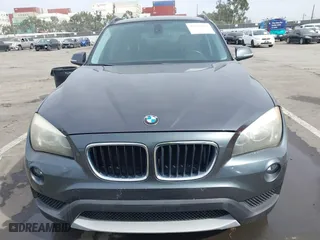 2013 BMW X1 28i with VIN WBAVM1C55DVW41609, listed as a IAAI auction lot 41604038 with 126,036 mi miles. Bid and sale history available at carsss.com. Image 6.