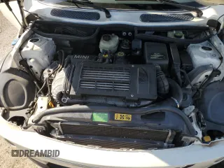 2006 MINI Convertible S с VIN WMWRH33546TF85908, выставлен на аукционе Copart как лот 61363025 с пробегом 105 053 миль миль и Списание • Salvage title. История ставок и продаж доступна на DreamBid. Изображение 11.