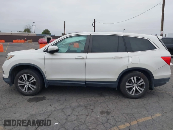 2016 Honda Pilot EX-L with VIN 5FNYF5H54GB037742, listed as a IAAI auction lot 41988112 with 68,459 mi miles and . Bid and sale history available at DreamBid. Image 14.