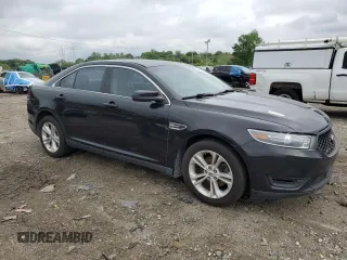 2014 Ford Taurus SEL z VIN 1FAHP2E85EG184686, wystawiony jako Copart lot #55862775 z przebiegiem 238 217 mil mil oraz Czysty tytuł • Clean title. Historia ofert i sprzedaży dostępna na DreamBid. Obrazek 4.