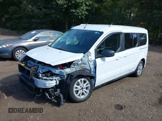 2019 Ford Transit Connect XLT z VIN NM0GE9F27K1405537, wystawiony jako IAAI lot #40491021 z przebiegiem 21 867 mil mil oraz . Historia ofert i sprzedaży dostępna na DreamBid. Obrazek 18.