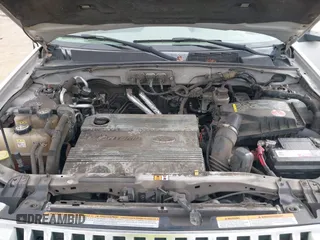 2008 Mercury Mariner with VIN 4M2CU39H58KJ39854, listed as a IAAI auction lot 41567810 with 267,329 mi miles and . Bid and sale history available at DreamBid. Image 10.