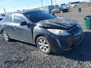 2011 Mazda Mazda3 i Touring with VIN JM1BL1VG5B1436934, listed as a IAAI auction lot 41778850 with 169,688 mi miles. Bid and sale history available at carsss.com. Image 1.
