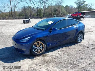 2023 Tesla Model Y Long Range with VIN 7SAYGDEE0PA114568, listed as a IAAI auction lot 41600762 with 12,772 mi miles. Bid and sale history available at carsss.com. Image 17.