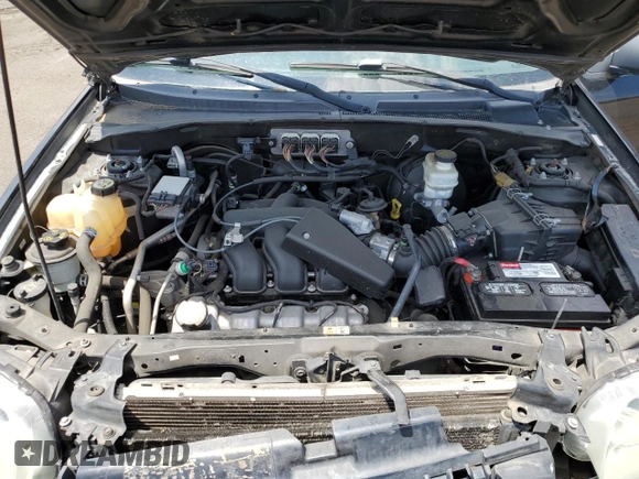2007 Ford Escape Limited z VIN 1FMYU04137KA07206, wystawiony jako Copart lot #62421035 z przebiegiem 200 117 mil mil oraz Szkoda całkowita • Salvage title. Historia ofert i sprzedaży dostępna na DreamBid. Obrazek 13.