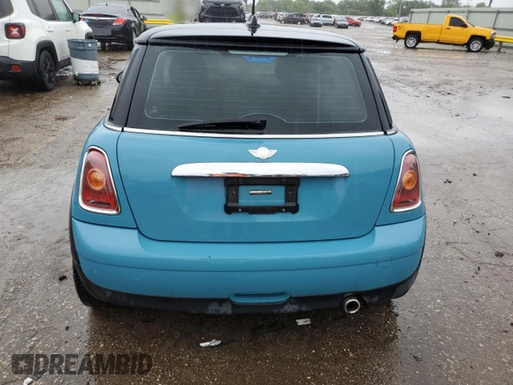 2009 MINI Hardtop z VIN WMWMF33539TT69470, wystawiony jako Copart lot #59624825 z przebiegiem 132 959 mil mil oraz Szkoda całkowita • Salvage title. Historia ofert i sprzedaży dostępna na DreamBid. Obrazek 6.