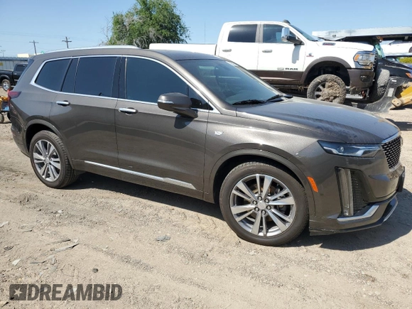 2020 Cadillac XT6 FWD Premium Luxury with VIN 1GYKPCRS1LZ199080, listed as a Copart auction lot 52252865 with 68,494 mi miles and Salvage title. Bid and sale history available at DreamBid. Image 4.