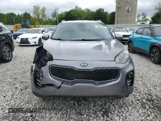 2017 Kia Sportage LX z VIN KNDPMCAC6H7183873, wystawiony jako Copart lot #58050925 z przebiegiem 116 754 mil mil oraz Czysty tytuł • Clean title. Historia ofert i sprzedaży dostępna na DreamBid. Obrazek 5.