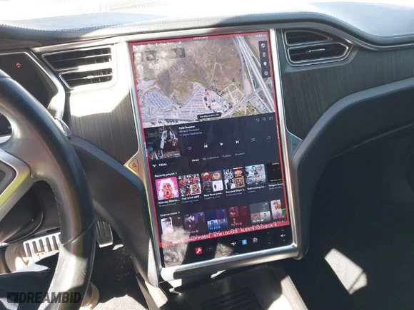 2013 Tesla Model S with VIN 5YJSA1DN4DFP19552, listed as a IAAI auction lot 41360466 with 129,806 mi miles. Bid and sale history available at carsss.com. Image 19.