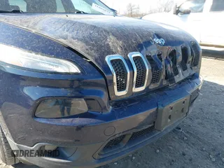 2014 Jeep Cherokee Latitude z VIN 1C4PJMCS6EW145810, wystawiony jako IAAI lot #41802031 z przebiegiem 143 358 mil mil oraz . Historia ofert i sprzedaży dostępna na DreamBid. Obrazek 17.