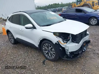 2020 Ford Escape Titanium Hybrid z VIN 1FMCU0DZ9LUC25231, wystawiony jako IAAI lot #42635182 z przebiegiem 60 607 mil mil oraz . Historia ofert i sprzedaży dostępna na DreamBid. Obrazek 1.