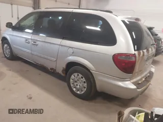 2005 Chrysler Town & Country LX с VIN 2C4GP44RX5R402180, выставлен на аукционе IAAI как лот 42062043 с пробегом 239 327 миль миль и . История ставок и продаж доступна на DreamBid. Изображение 3.