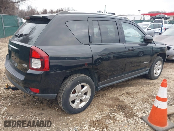 2016 Jeep Compass Latitude with VIN 1C4NJCEBXGD642680, listed as a IAAI auction lot 41511653 with 122,742 mi miles. Bid and sale history available at carsss.com. Image 4.