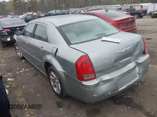 2006 Chrysler 300 Touring with VIN 2C3KA53G56H112376, listed as a IAAI auction lot 41919098 with 309,184 mi miles. Bid and sale history available at carsss.com. Image 3.