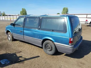 1993 Dodge Grand Caravan with VIN 1B4GH54R3PX606744, listed as a IAAI auction lot 42135204 with 159,517 mi miles and . Bid and sale history available at DreamBid. Image 3.