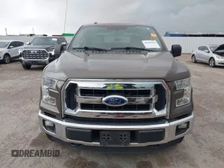 2015 Ford F-150 XLT with VIN 1FTEW1EP1FKE71345, listed as a IAAI auction lot 41946214 with 314,016 mi miles and . Bid and sale history available at DreamBid. Image 12.