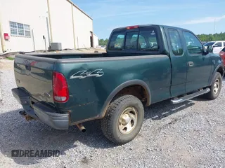 2003 Ford F-150 XL z VIN 1FTRX18L13NB27919, wystawiony jako IAAI lot #42313184 z przebiegiem 113 846 mil mil oraz . Historia ofert i sprzedaży dostępna na DreamBid. Obrazek 4.