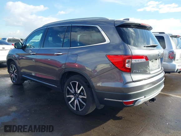 2019 Honda Pilot Touring 7-Passenger z VIN 5FNYF5H65KB020420, wystawiony jako IAAI lot #41575972 z przebiegiem 48 950 mil mil oraz . Historia ofert i sprzedaży dostępna na DreamBid. Obrazek 3.