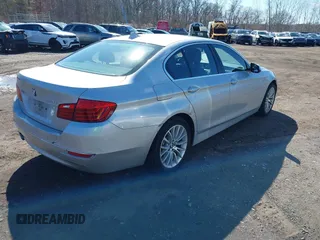 2014 BMW 5 Series 528i xDrive with VIN WBA5A7C58ED617131, listed as a IAAI auction lot 41749651 with 117,954 mi miles and . Bid and sale history available at DreamBid. Image 4.