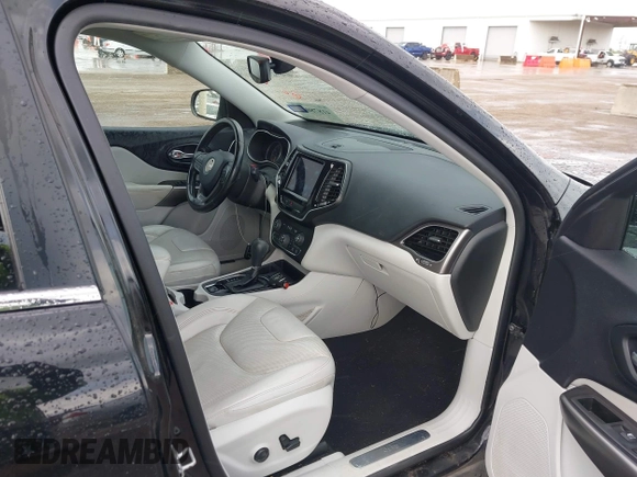 2020 Jeep Cherokee Limited with VIN 1C4PJLDB0LD614312, listed as a IAAI auction lot 41878036 with 92,282 mi miles and . Bid and sale history available at DreamBid. Image 5.