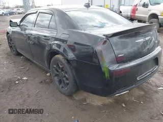 2015 Chrysler 300 with VIN 2C3CCAGGXFH831351, listed as a IAAI auction lot 41721941 with 106,577 mi miles. Bid and sale history available at carsss.com. Image 3.