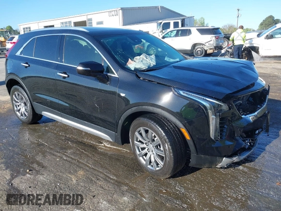 2021 Cadillac XT4 FWD Premium Luxury with VIN 1GYFZCR43MF052422, listed as a IAAI auction lot 41985859 with 25,112 mi miles. Bid and sale history available at carsss.com. Image 1.