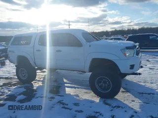 2014 Toyota Tacoma with VIN 3TMLU4EN0EM147193, listed as a IAAI auction lot 41280636 with 162,345 mi miles. Bid and sale history available at carsss.com. Image 13.
