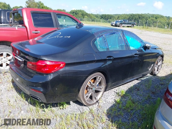 2018 BMW 5 Series M550i xDrive с VIN WBAJB9C59JB286170, выставлен на аукционе IAAI как лот 42726658 с пробегом Не указан миль и . История ставок и продаж доступна на DreamBid. Изображение 4.