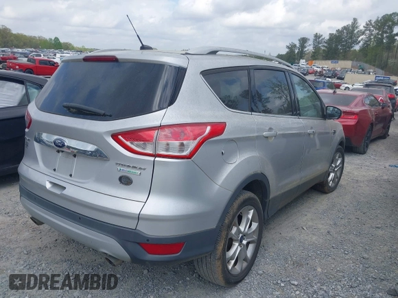 2015 Ford Escape Titanium with VIN 1FMCU0J98FUA87044, listed as a IAAI auction lot 41952096 with 257,437 mi miles. Bid and sale history available at carsss.com. Image 4.