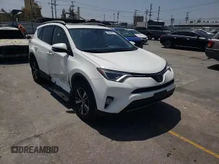 2018 Toyota RAV4 XLE with VIN JTMWFREVXJD118021, listed as a Copart auction lot 58845805 with 108,068 mi miles and Salvage title. Bid and sale history available at DreamBid. Image 14.