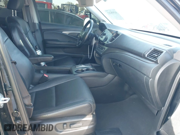 2021 Honda Pilot EX-L with VIN 5FNYF5H5XMB021833, listed as a IAAI auction lot 41935222 with 65,165 mi miles and . Bid and sale history available at carsss.com. Image 5.