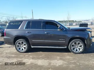 2016 GMC Yukon Denali with VIN 1GKS2CKJ0GR252965, listed as a IAAI auction lot 41628897 with 109,828 mi miles. Bid and sale history available at carsss.com. Image 13.